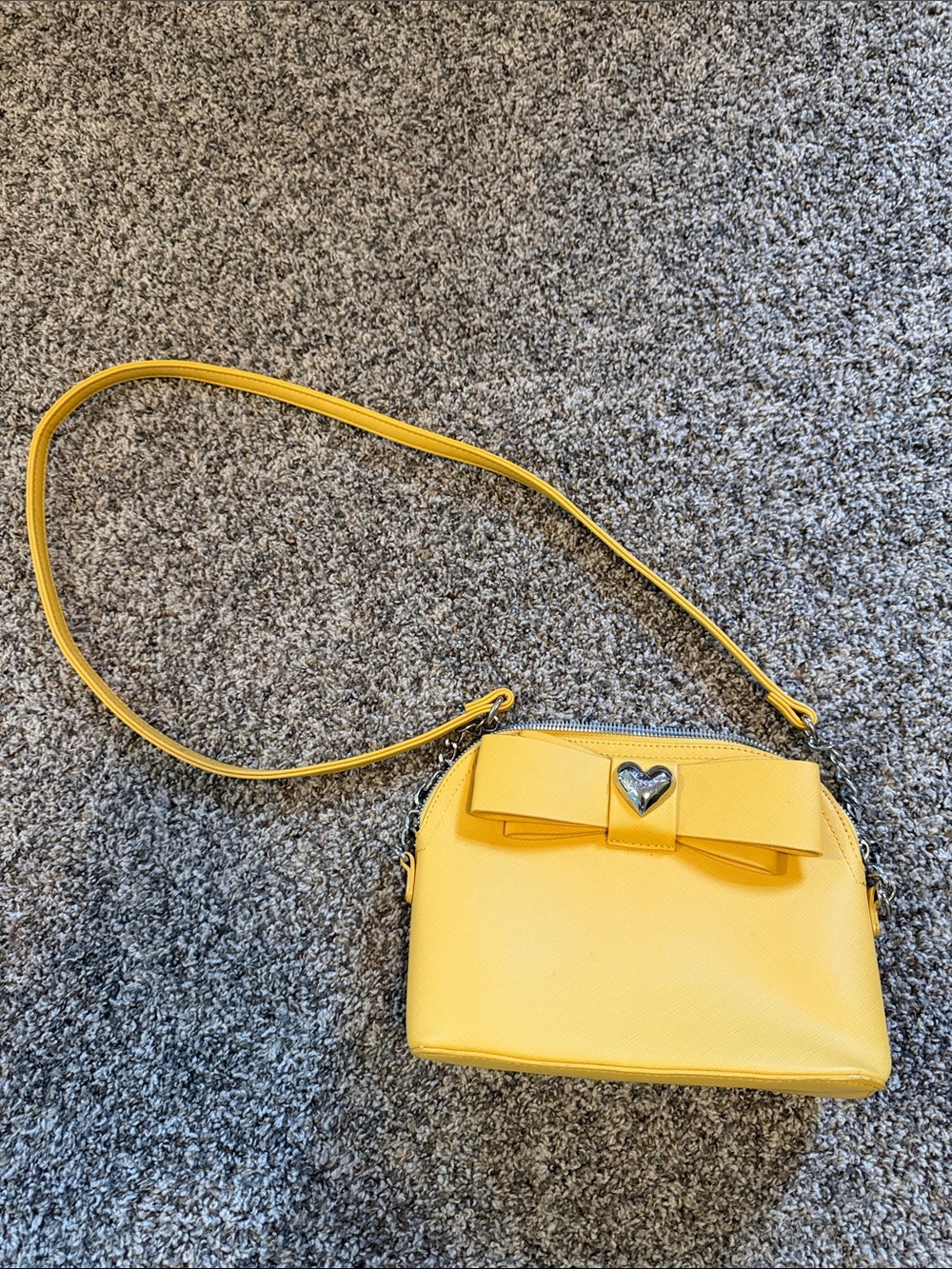 Betsey Johnson Yellow Bow Accent Crossbody Bag. Light spots on back.